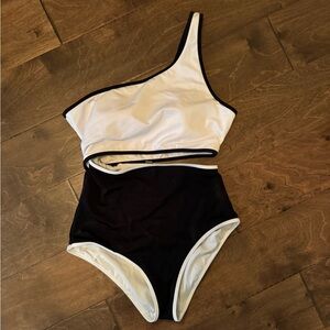 White and black VS cut out swimsuit